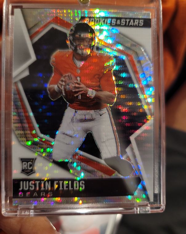 2021 Panini Rookies & Stars Pulsar Prizm #104 Justin Fields — front