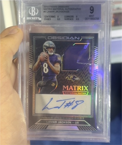 2019 Panini Obsidian Matrix Material Autographs #Lamar Jackson — front