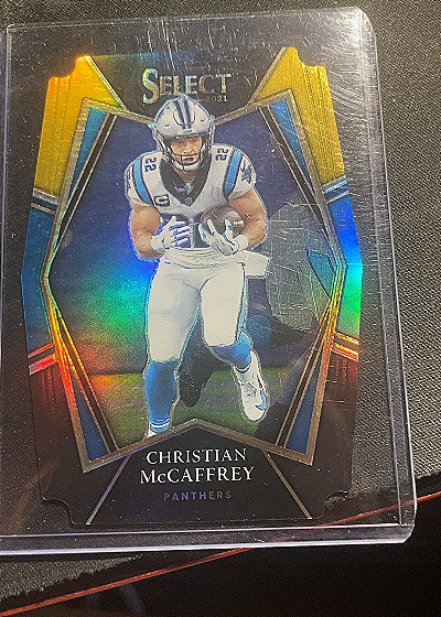 2021 Panini Select Premier Level #107 Christian McCaffrey — front