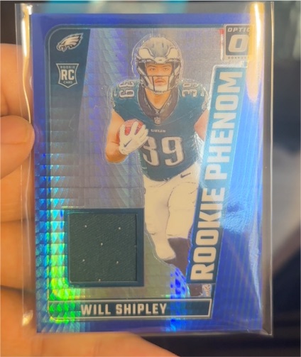 2024 Panini Donruss Optic #RPB-WSY Will Shipley Rookie Phenom Blue Hyper Prizm Patch — front