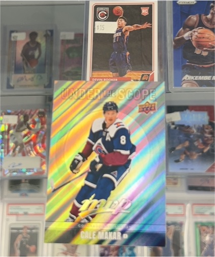 2023-24 Upper Deck MVP Under The Scope #MVP-UM Cale Makar — front