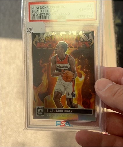 2023 Donruss Optic #11 Bilal Coulibaly Red Hot Rookies Holo — front