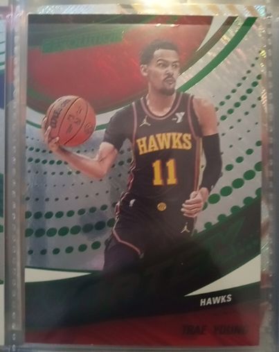 2024-25 Panini Revolution #23 Trae Young Vortex — front