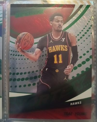 2024-25 Panini Revolution #23 Trae Young — front