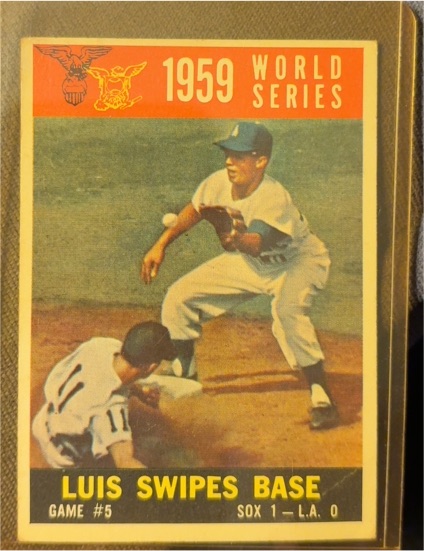 1960 Topps #389 Luis Aparicio 1959 World Series Game 5 Luis Swipes Base — front