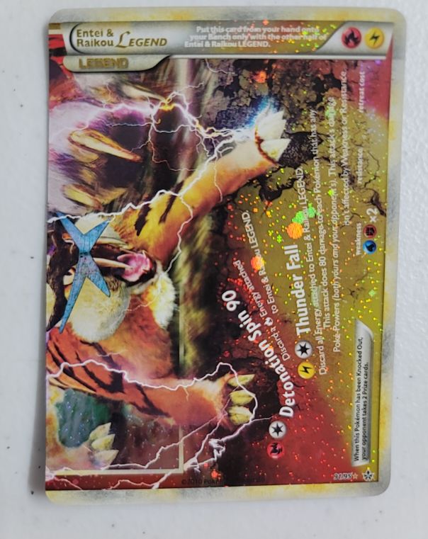 2010 Pokémon HeartGold & SoulSilver Unleashed #91 Entei & Raikou Legend — front