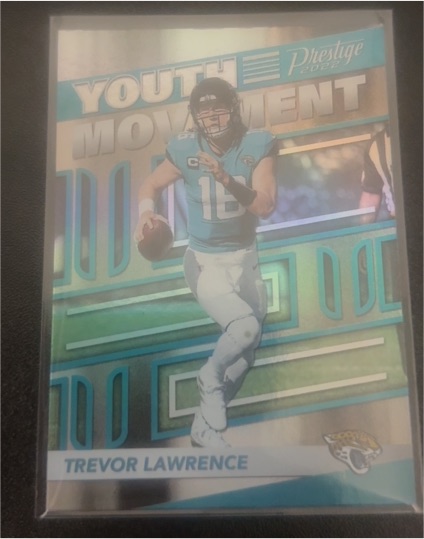 2022 Panini Prestige #YM-6 Trevor Lawrence Youth Movement — front