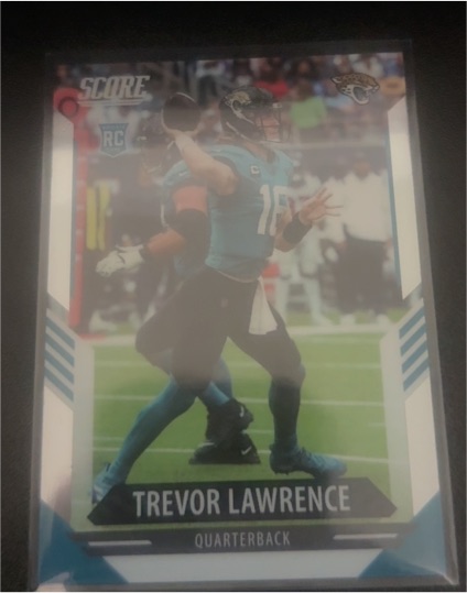 2021 Panini Chronicles Score #401 Trevor Lawrence Rookie — front