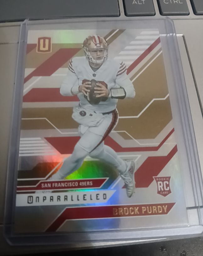 2022 Panini Chronicles Unparalleled #UNP-4 Brock Purdy — front