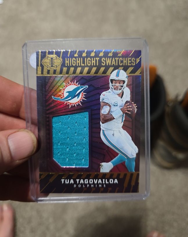 2024 Panini Illusions Highlight Swatches #HS-TTA Tua Tagovailoa — front