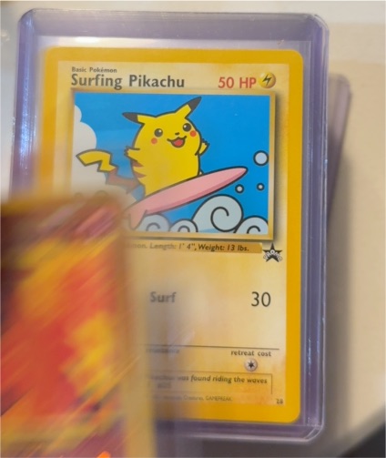 2001 Pokémon Black Star Promo #28 Surfing Pikachu — front
