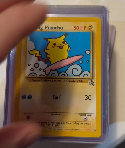 2000 Wizards of the Coast Black Star Promo #28 Surfing Pikachu — front