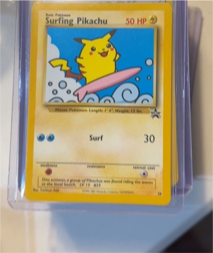 2001 Wizards of the Coast Black Star Promo #28 Surfing Pikachu — front