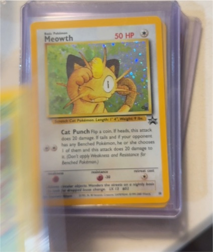 2000 Pokémon #10 Meowth Black Star Promo — front