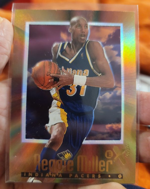 1996-97 SkyBox E-X2000 #27 Reggie Miller — front