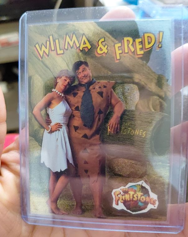 1993 Topps The Flintstones Movie Flint-Foil #1 Wilma & Fred — front