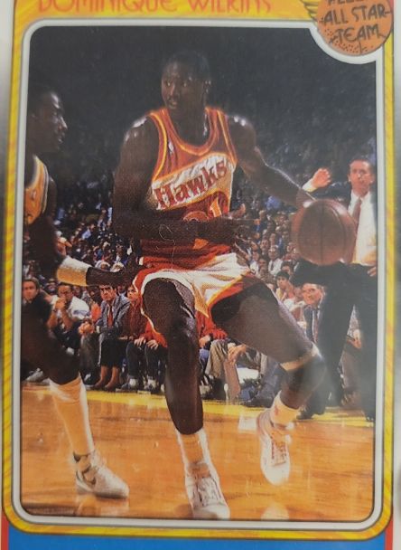 1986 Topps #1 Dominique Wilkins — front