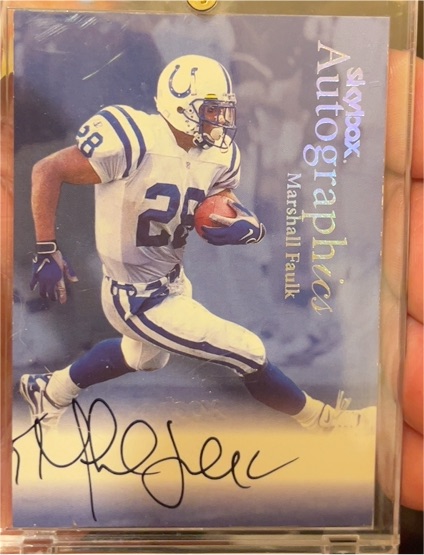 1999 Skybox Autographics Marshall Faulk — front