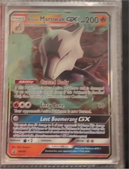 2017 Pokémon Sun & Moon Black Star Promo #SM187 Alolan Marowak GX — front