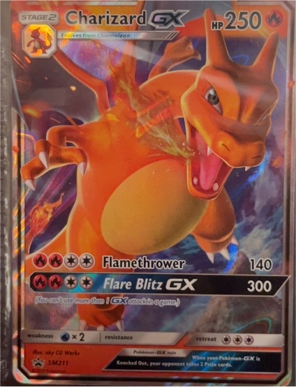 2019 Pokémon SM Black Star Promo #SM211 Charizard GX — front