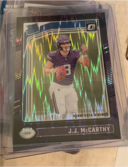 2024 Donruss Optic #235 J.J. McCarthy Purple Shock Rated Rookie — front