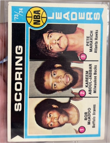 1974-75 Topps #144 NBA Scoring Leaders Bob McAdoo Kareem Abdul-Jabbar Pete Maravich — front