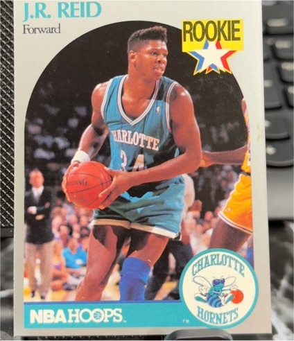 1990-91 NBA Hoops #57 J.R. Reid — front