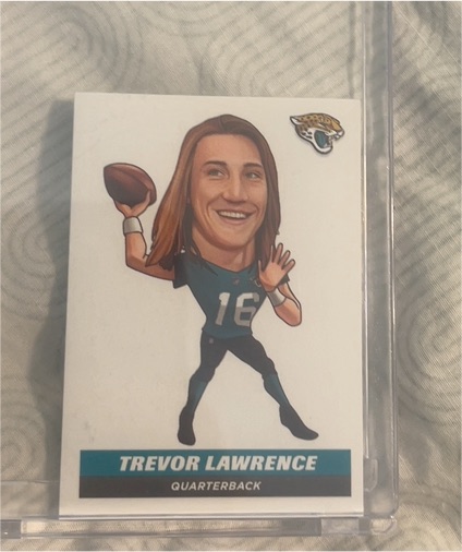 2021 Panini NFL Sticker #201 Trevor Lawrence — front