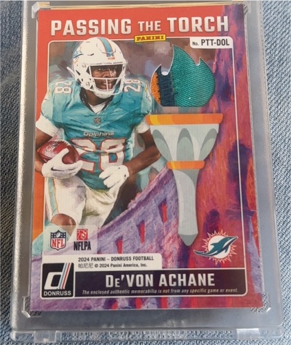 2024 Panini Donruss Passing The Torch #PTT-DOL De'Von Achane — front
