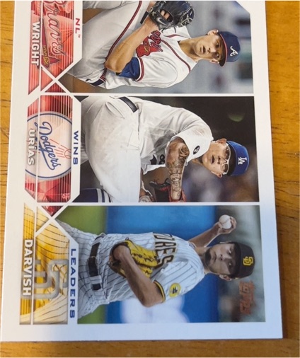 2023 Topps #284 NL Wins Leaders (Kyle Wright / Julio Urías / Yu Darvish) — front