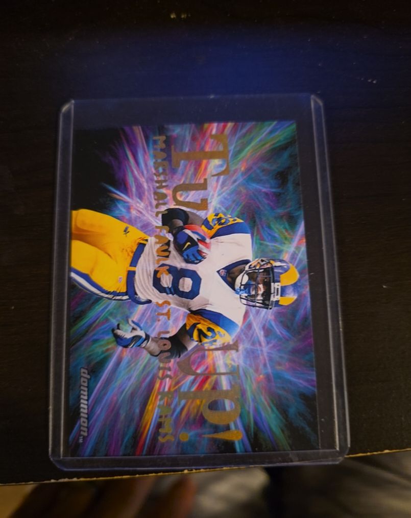 2000 SkyBox Dominion #4 Marshall Faulk Turfs Up! — front