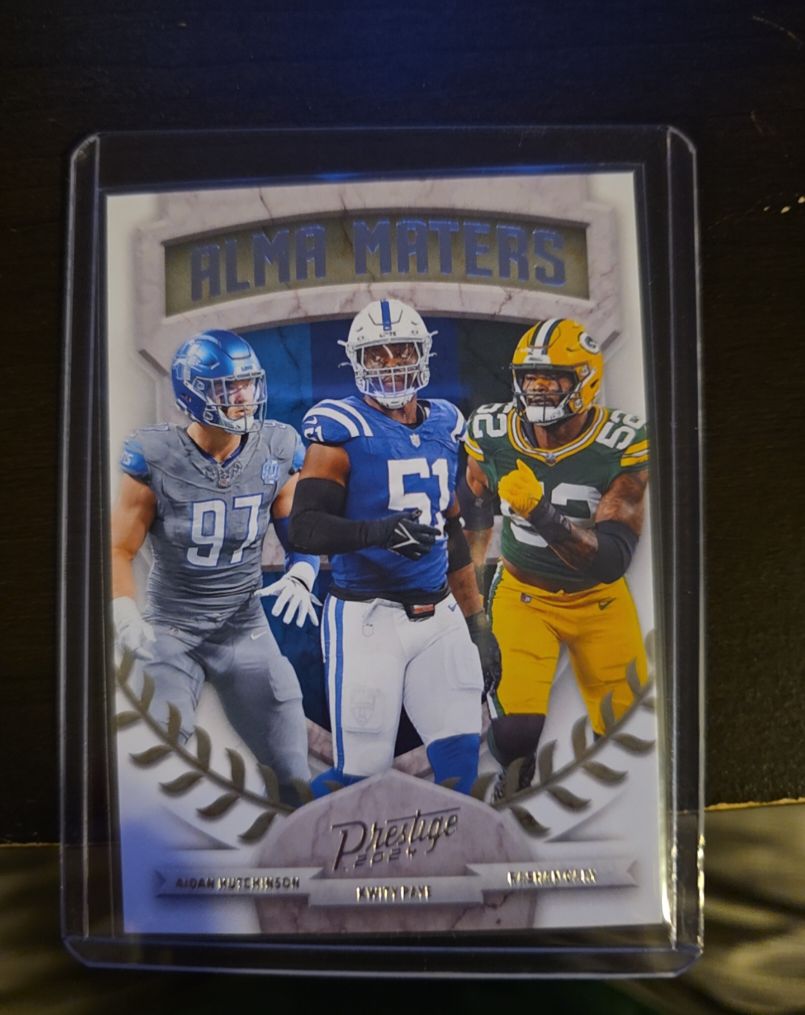 2024 Panini Prestige #11 Alma Maters Aidan Hutchinson, Kwity Paye, Rashan Gary — front