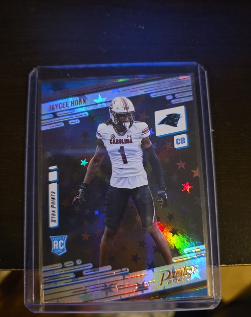 2021 Panini Prestige #246 Jaycee Horn Xtra Points Astral Rookie — front