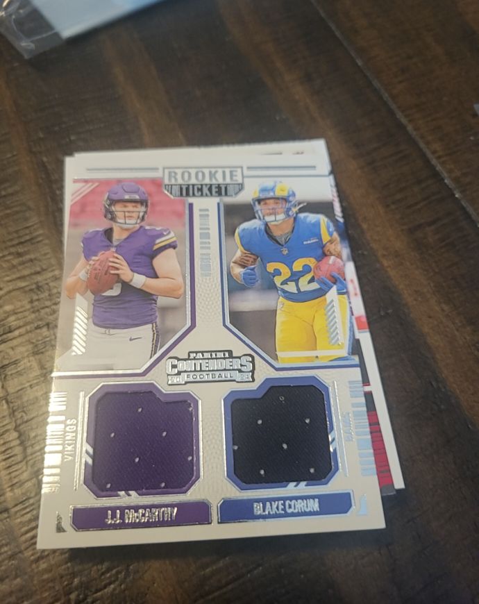 2024 Panini Contenders #DS-2 J.J. McCarthy & Blake Corum Rookie Ticket Dual Patch — front