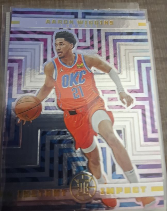 2021-22 Panini Illusions Instant Impact #28 Aaron Wiggins — front