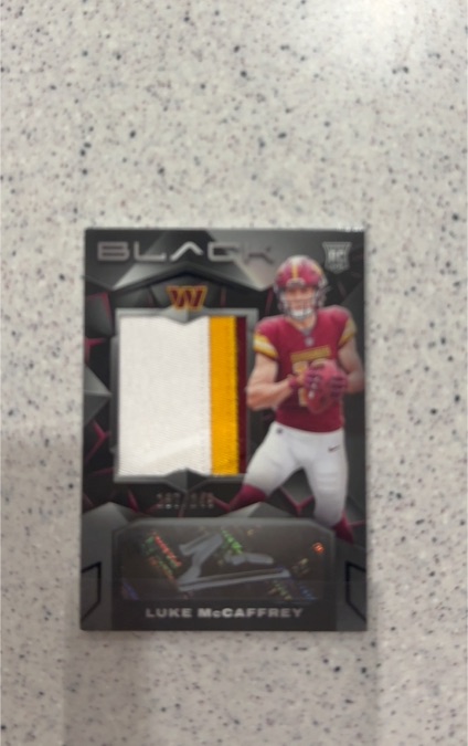 2024 Panini Black #228 Luke McCaffrey — front