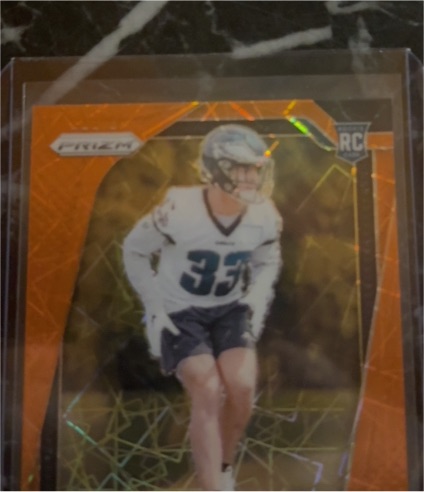 2024 Panini Prizm #321 Orange Laser Prizm Rookie Card — front