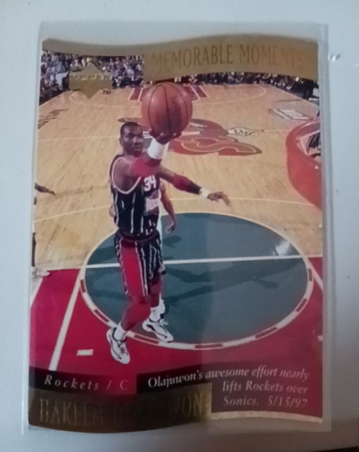 1997-98 Upper Deck Collector's Choice #8 Hakeem Olajuwon Memorable Moments — front