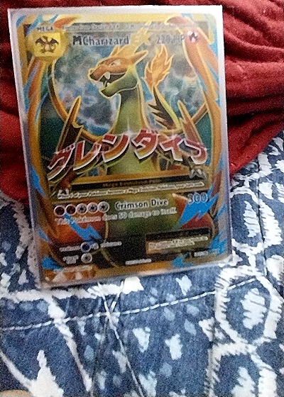 2016 Pokémon XY Evolutions #101 M Charizard EX — front