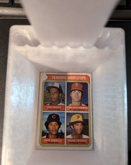 1974 Topps #604 Rookie Shortstops Leo Foster, Tom Heintzelman, Dave Rosello, Frank Taveras — front