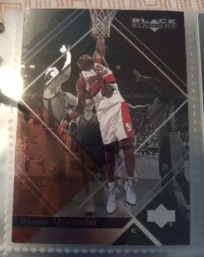 1999-00 Upper Deck Black Diamond #1 Dikembe Mutombo — front