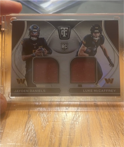 2024 Panini Totally Certified #RDS-WAS Jayden Daniels Luke McCaffrey Dual Patch Rookie Card — front