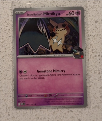 2021 Pokémon Team Rocket's Mimikyu #087 — front