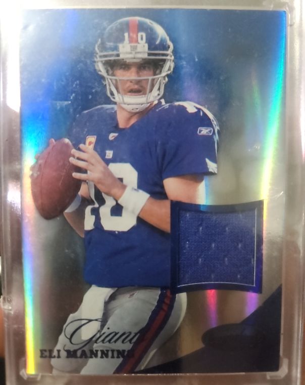 2004 Topps Rookie Materials #RM-EA Eli Manning — front