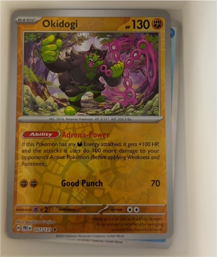 2025 Pokémon S&V Prismatic Evolutions #057 Okidogi — front