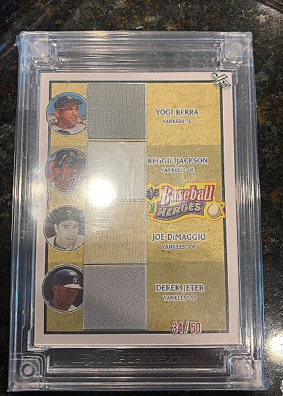 2008 Upper Deck Baseball Heroes #196 Yogi Berra/Reggie Jackson/Joe DiMaggio/Derek Jeter — front