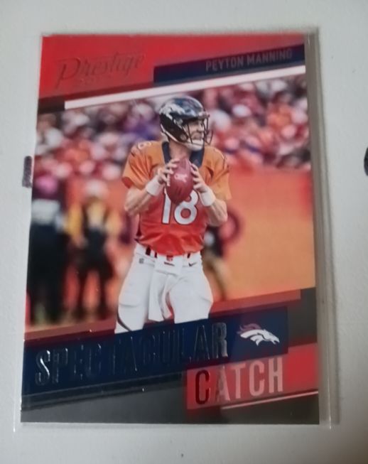 2017 Panini Prestige Spectacular Catch #22 Peyton Manning — front