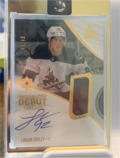 2023-24 Upper Deck Ultimate Collection Autographed Debut Threads #ADT-LC Logan Cooley — front