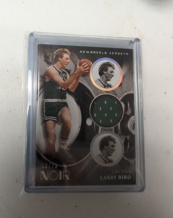 2020-21 Panini Noir Newsreels Jerseys #NRJ-LB Larry Bird — front