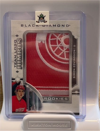 2023-24 Upper Deck Black Diamond Rookie Team Logo Jumbo Patches #RTL-SE Simon Edvinsson — front